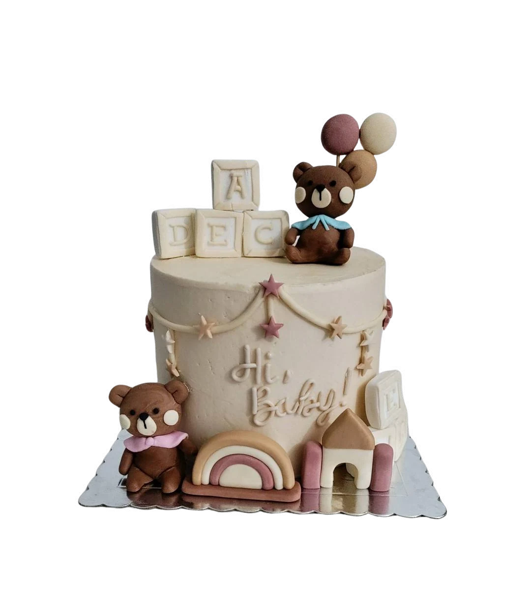 Tarta de baby shower con castillo, arcoíris y ositos